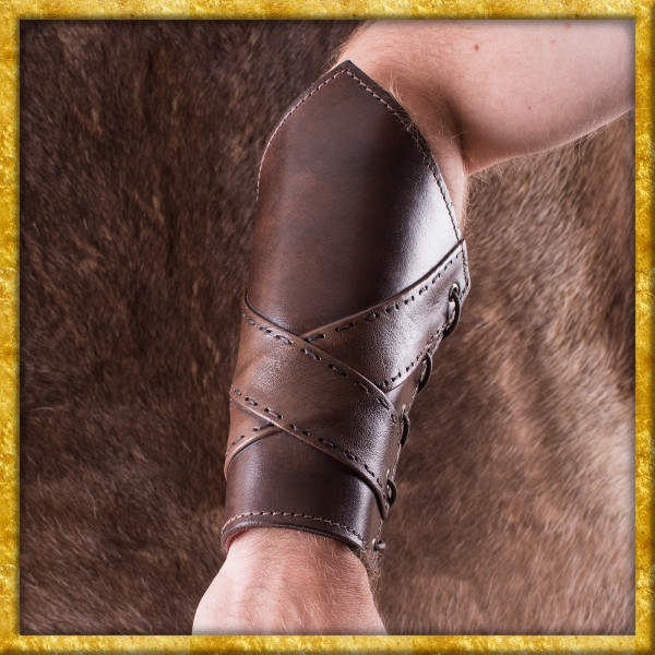 Gepolsterte Armstulpen aus Leder mit gekreuzten Bändern